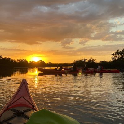 a sunset over a body of water